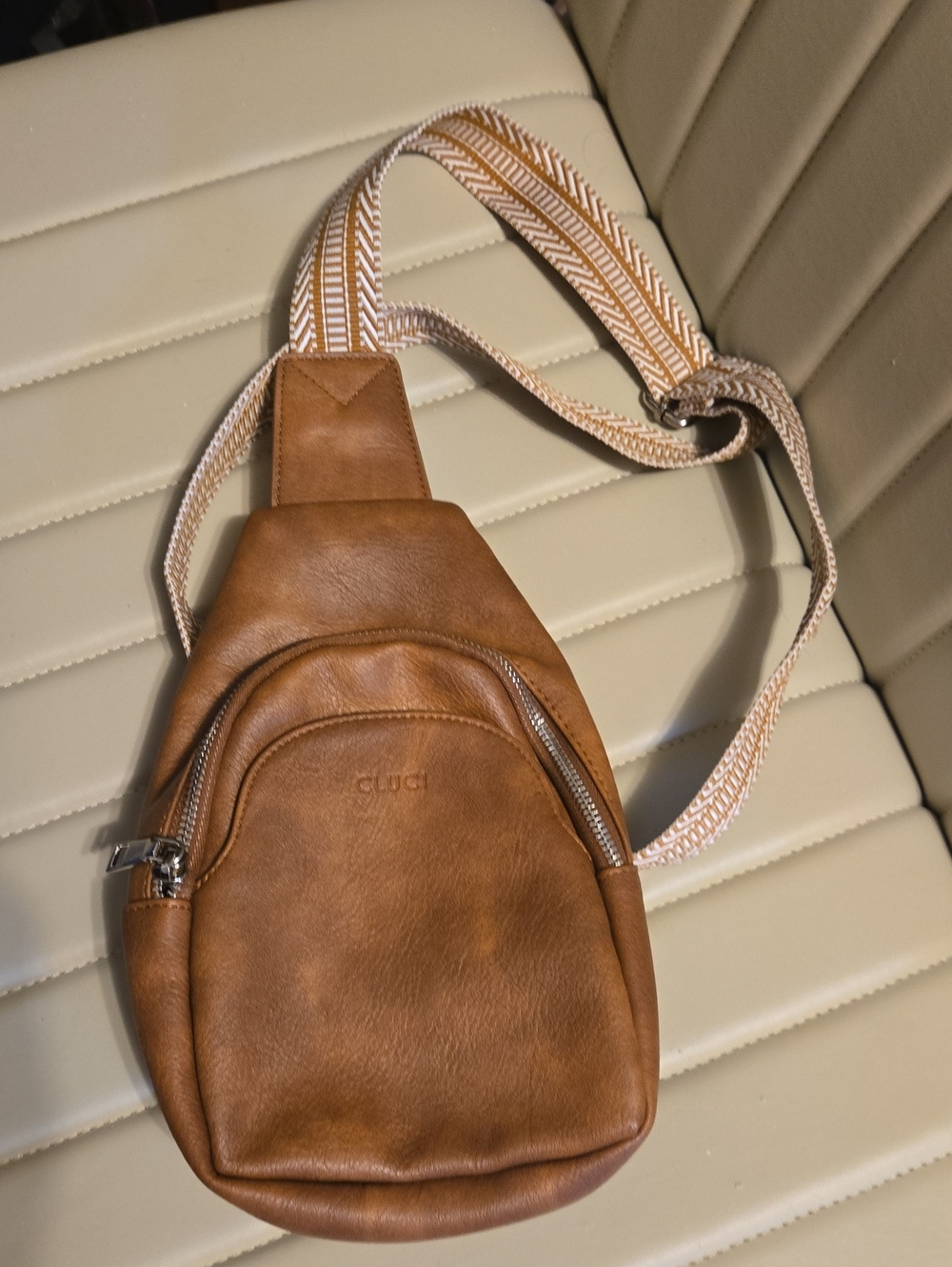Brown Leather Sling Bag with Cream Strap